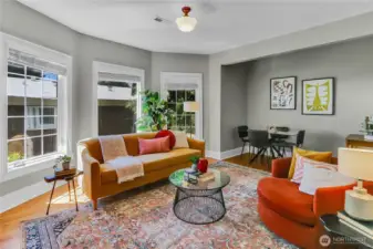 Open-concept living room and kitchen create an ideal space for easy entertaining, seamlessly flowing to the balcony for indoor–outdoor hosting and relaxed gatherings