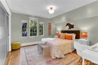 Serene fifth bedroom on the upper level, offering a quiet and flexible space.