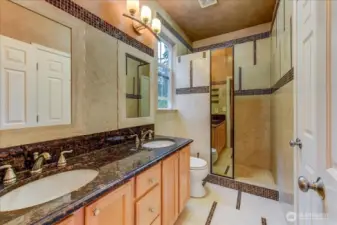 Luxurious tile finishes in the Jack and Jill en-suite bath