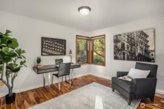 The extra room on the main level off of the living room is perfect for a 4th or guest bedroom, home office, or studio.