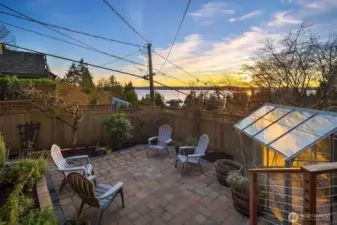 Enjoy your fully fenced backyard and greenhouse.