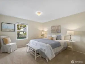 The large primary bedroom. There is new carpeting in each of the bedrooms.