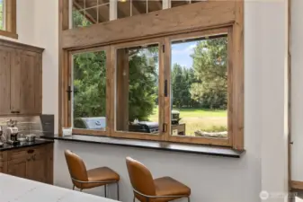 Extra kitchen eating space and folding window, great for cooking and brining in fresh mountain air!