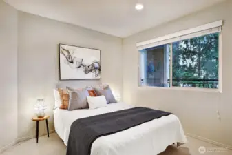 Guest bedroom with new carpeting.