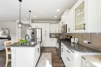 Lovely kitchen open to the main floor living area and eating nook