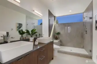 Primary bath with walk-in, tile shower.