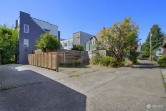 2-car tandem parking assigned to this townhome is located off alley.