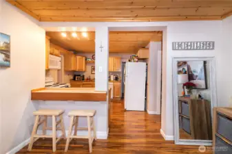 Eating bar off of the kitchen.