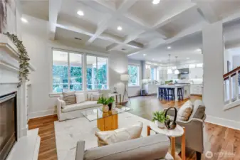 Light & bright, this open floor plan flows from living room to kitchen and out to the spacious covered back patio.