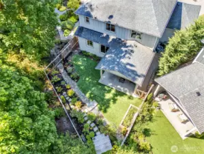 Fully fenced with the backyard surrounded by greenery!