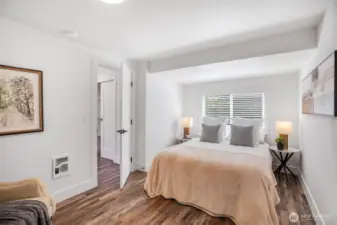 Bedroom on main floor with South and West facing windows.