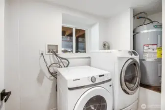 Utility room located on the lower level with full size washer & dryer.