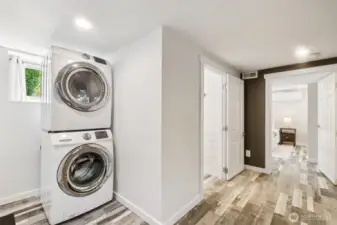 Lower level laundry area and access to the garage