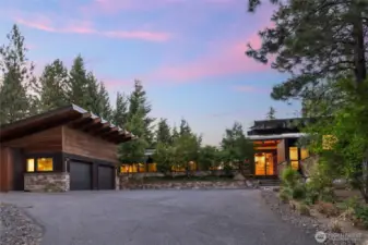 Garage includes: EV charging, temp-controlled wine cellar & abundant storage.