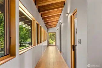 The gallery leads to 3 bedrooms and 2 bathrooms.