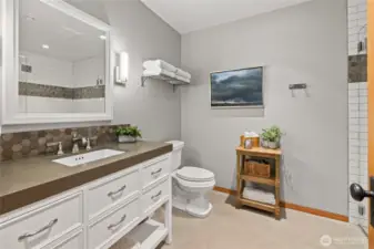 Bathroom one is next to bedroom one and easily accessible for guests.