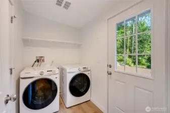 Utility/mudroom with direct backyard access