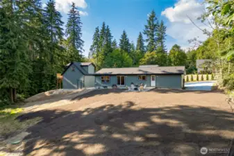 Showcasing this charming home with a spacious yard and detached garage