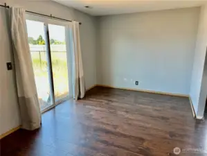 Dining room with access to the rear patio and backyard.