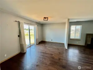 Main floor with open dining area that adjoins the living and kitchen areas.