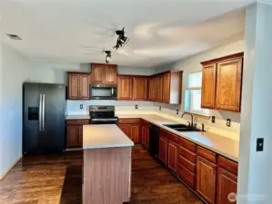 Another view...laminate floor and all appliances included!