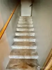 Stairs to the upper floor...primary bedroom, 3 large bedrooms, primary bath and full hall bath.