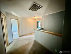 Upper landing area with nice wide halls granting easy access to all 4 bedrooms.