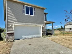 2 car attached garage with electric door opener.
