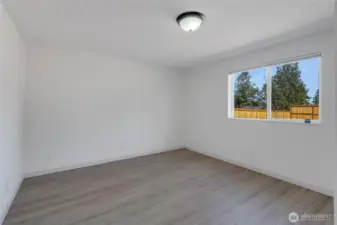 Second bedroom overlooks back yard.