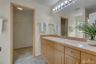 Large tile counter and plenty of storage.