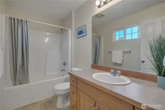 How perfect is this for guests?  And a window!  We love windows in bathrooms.