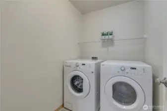 Convenient upstairs laundry.