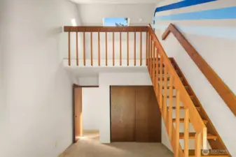 bedroom 2 upstairs w/balcony