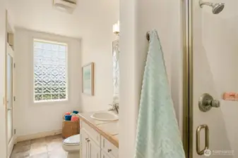 Beach bath wiith entry from hall and outside.