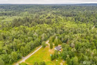best building area is to the right of the home in photo
