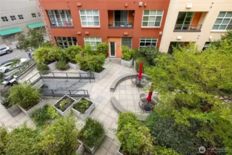 View of the courtyard. You can also enter it from the street with your fob. Perfect place to meet up with friends for a HH BBQ.