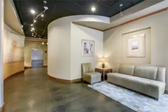 South entrance lobby is nicely appointed with easy proximity to the elevator just past the mail room.
