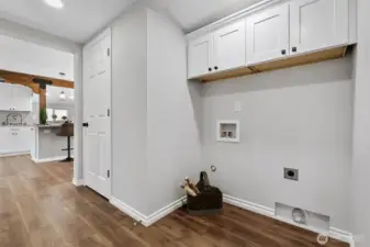 Utility Room/Linen/coat Closet Built in Shelving on both sides of Hallway