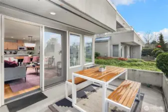 Not only is there ample room for hanging out on the patio but there is also an extra storage closet!