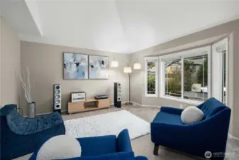 Formal living with vaulted ceiling.