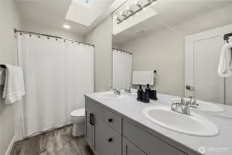 Hallway bath on upper floor.