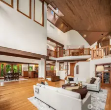 Living Room connects to skylit loft landing