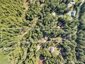 Arial of the property. Property boundary line is an estimation and not accurate to the exact parcel boundaries. See title report for plat map.