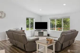 High ceilings and front windows bring in an abundance of sunlight.