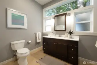 Main floor full bath is adjacent to the main floor bedroom making it easy for guests or a future main floor primary bedroom.