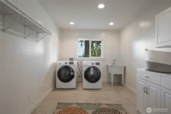 The spacious laundry room is conveniently located on the second floor.