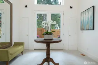 This elegant entry way is complete with two coat closets and an abundance of natural light.