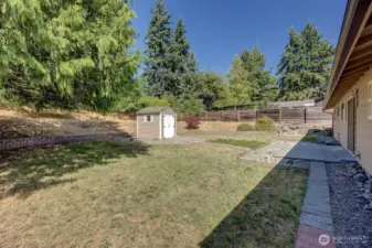 Oversized fully fenced back yard.