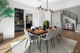 Open, yet formal dining room allows for an oversized table and a buffet. Great flow to the kitchen, adjacent dedicated dry bar, and a sliding glass door that leads to the outdoor covered dining area. Two ceiling speakers installed create an ambiance for memorable gatherings.