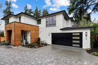 NW Contemporary style, Chaffey Building Group quality, and a location that can't be beat! Three-car tandem garage.
